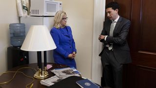 Congressman Liz Cheney talking with Communications Director Jeremy Adler in her office in the Cannon Building